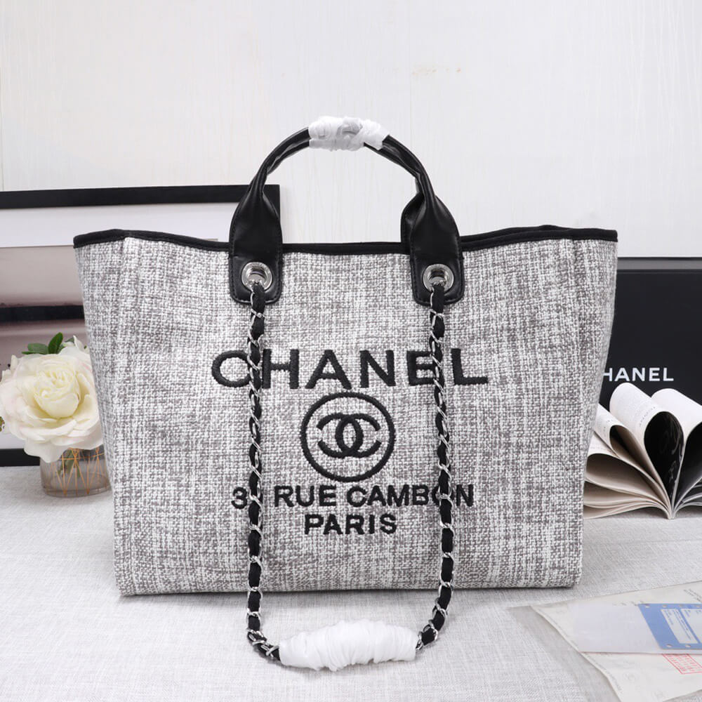Ch*el woven straw raffia striped medium deauville tote